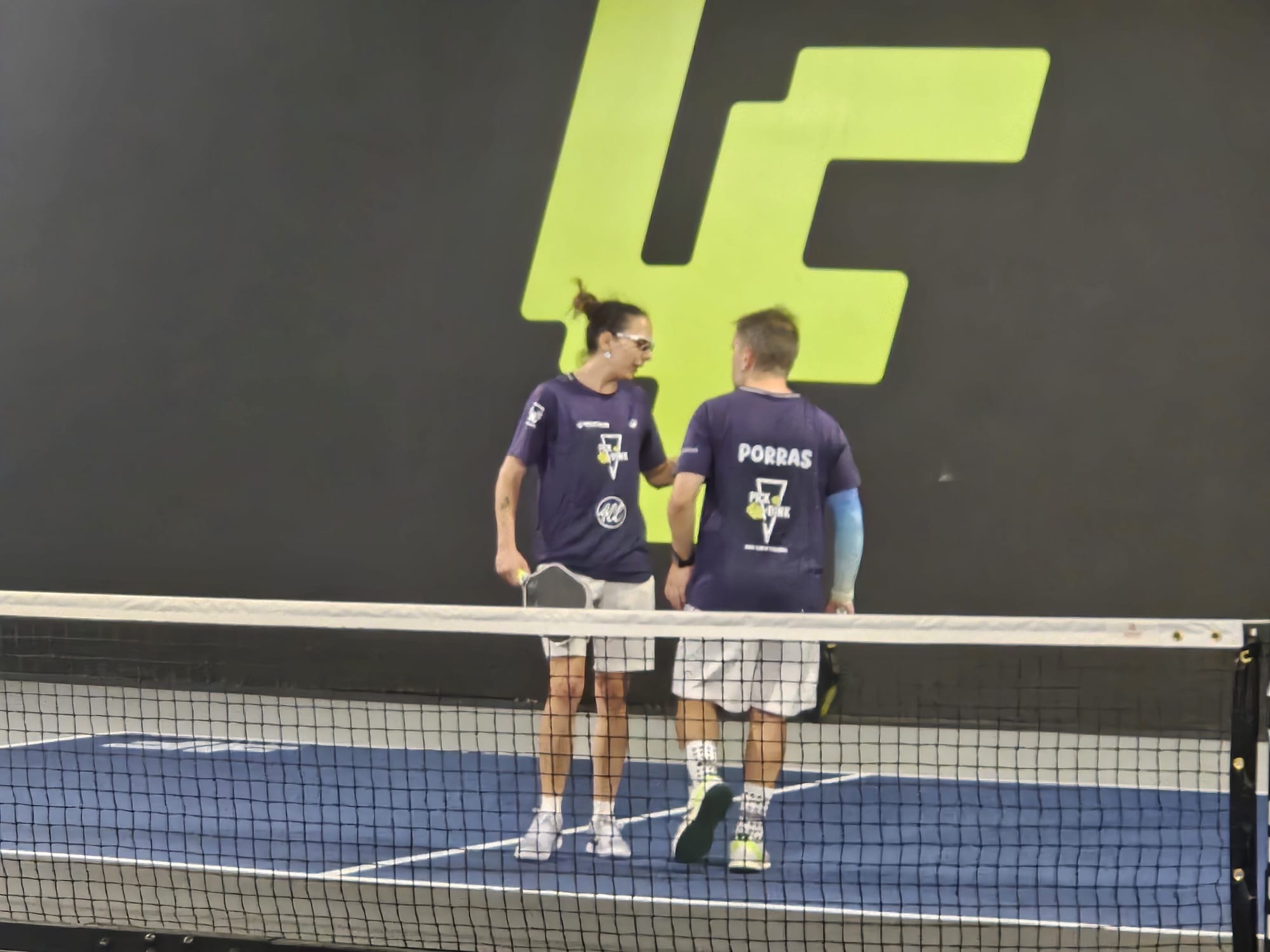 Partido de dobles oficial en la Liga de Madrid
